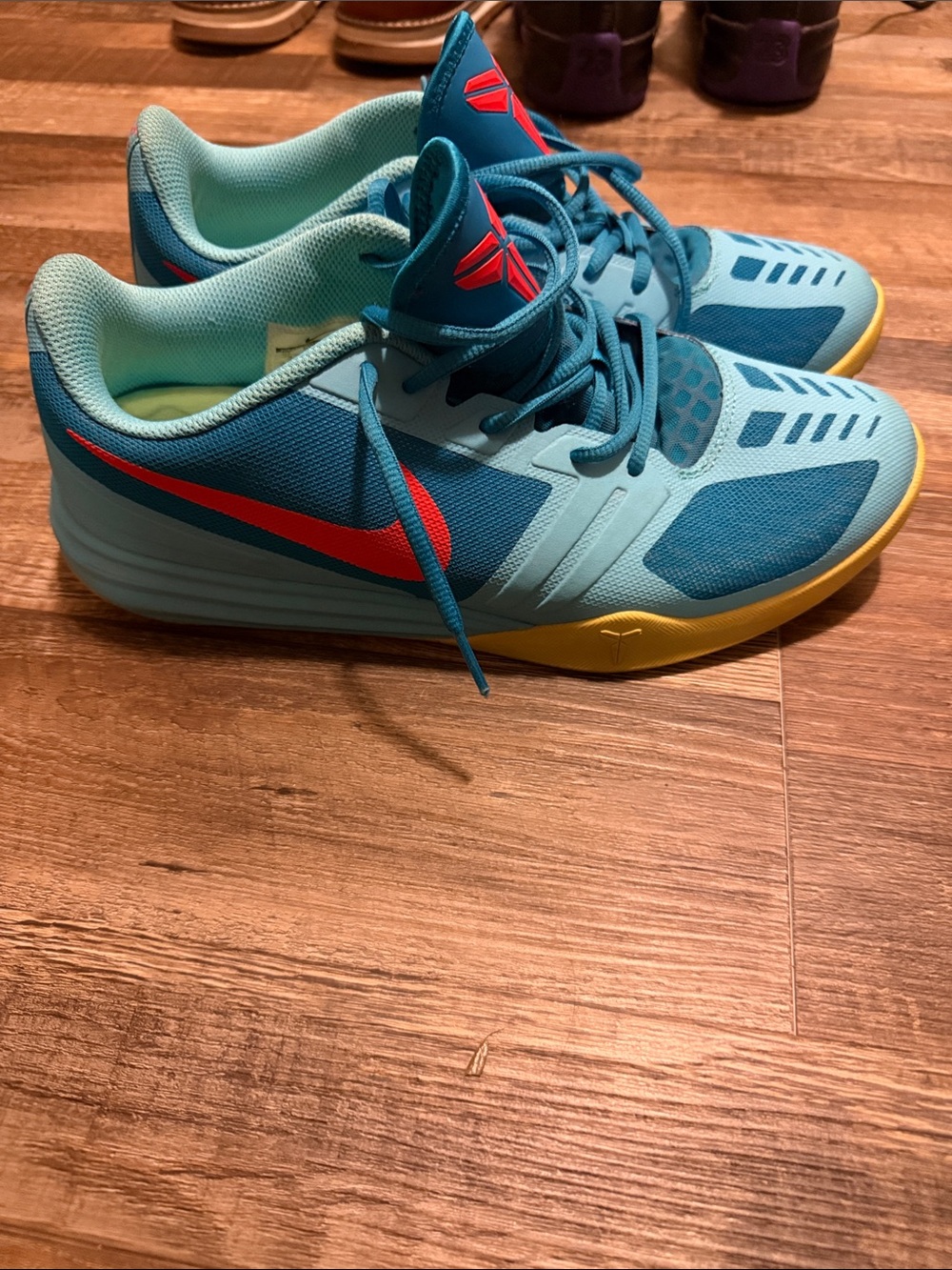 Nike KB Mentality Teal & Yellow Athletic Shoes with Red Swoosh